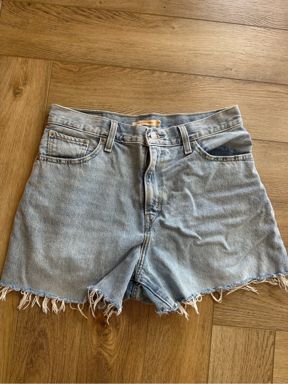 Levi's Light Blue High-Rise Cutoff Denim Shorts.